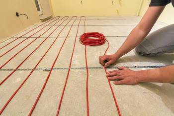 Chantier de plancher chauffant électrique